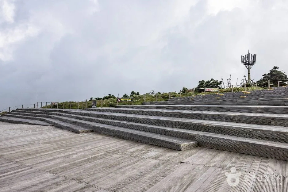 Wide wooden boardwalk decking on the high open part of the Yeongsil Trail